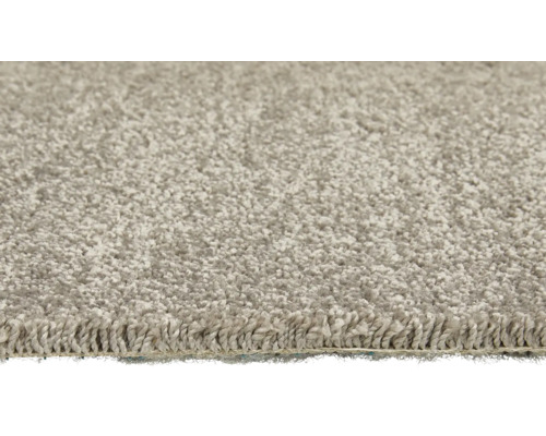 Nahaufnahme eines hellen Teppichs mit Schlingenstruktur