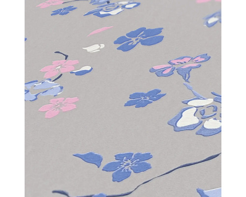 Gros plan d''un papier peint à motifs floraux