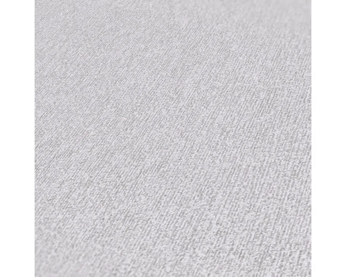 Gros plan d''un papier peint intissé de couleur claire avec une structure fine