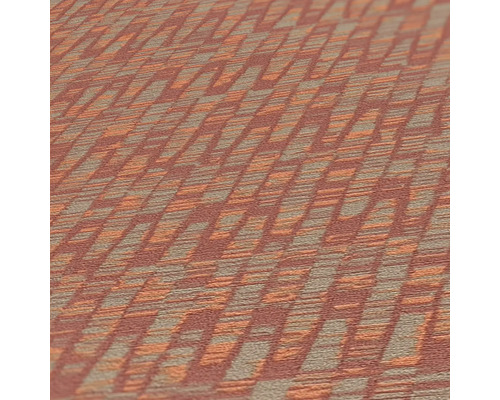 Gros plan d''un tapis avec un motif géométrique