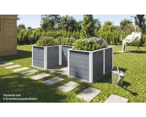 Deux bacs à fleurs gris en bois avec modules d''extension dans le jardin.