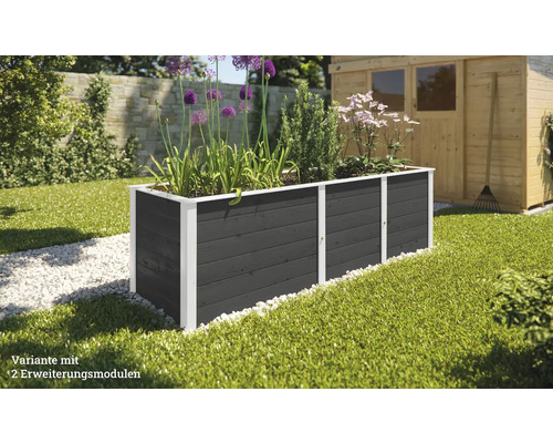 Jardinière longue avec modules d''extension dans le jardin avec plantes