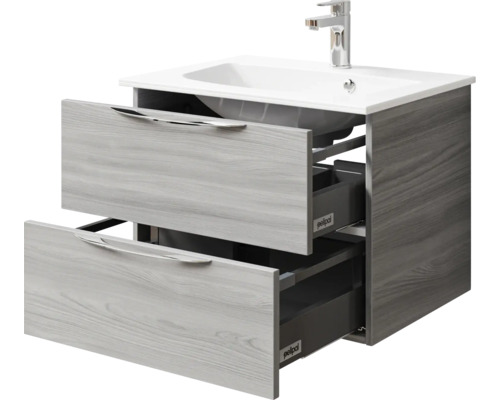 Meuble sous-lavabo avec deux tiroirs ouverts et lavabo à poser