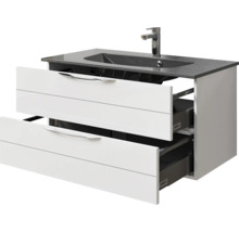 Meuble sous-lavabo avec deux tiroirs ouverts, lavabo et robinet