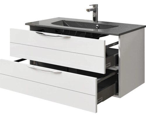 Meuble sous-lavabo avec deux tiroirs ouverts, lavabo et robinet