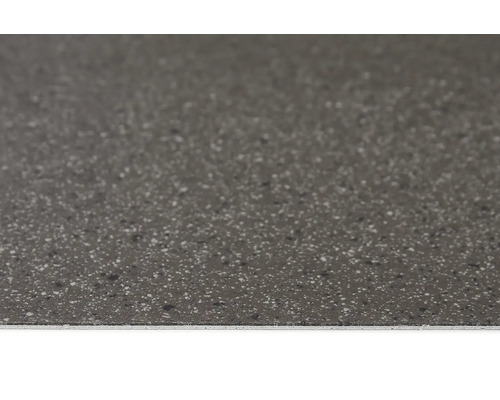 Gros plan d''un carreau de sol avec une texture mouchetée