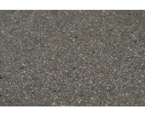 Gros plan d''un plan de travail avec une surface mouchetée