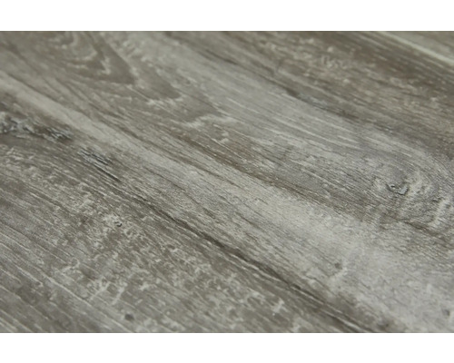 Nahaufnahme einer grauen Holzoberfläche mit Maserung