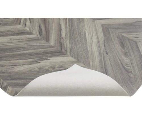 Vinylboden in Fischgrätoptik mit Filzunterlage