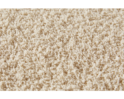 Nahaufnahme eines beigen Teppichs