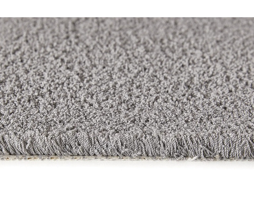 Detailaufnahme eines grauen Teppichs