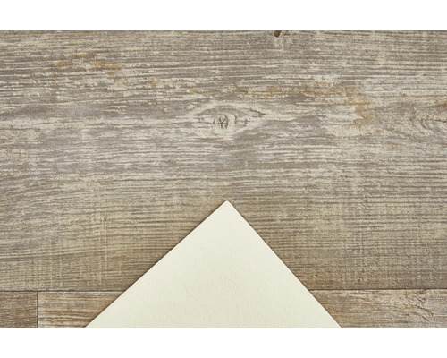 Holzboden mit Muster und Papierbogen