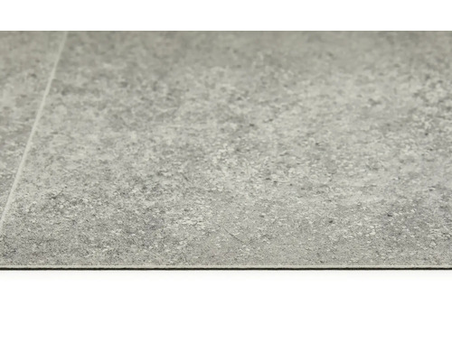 Gros plan de lames de plancher en vinyle avec décor en pierre