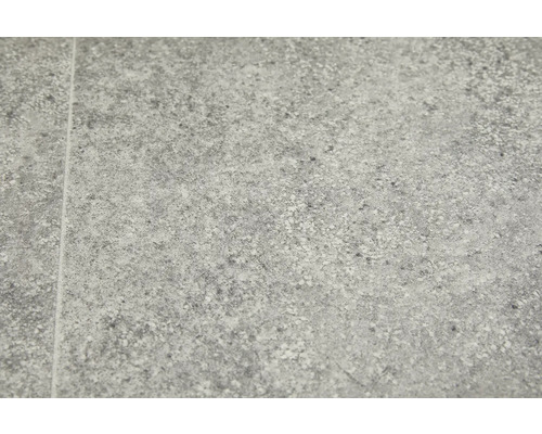 Gros plan d''un carreau de grès cérame gris avec une texture mouchetée