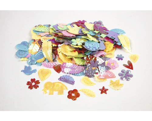 Haufen aus Dekosteinchen in verschiedenen Formen