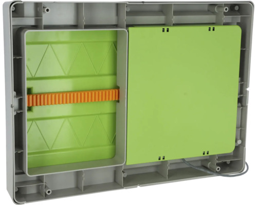 Innenansicht eines Lüftungsgerätes mit grünen Komponenten und einem orangefarbenen Zahnrad
