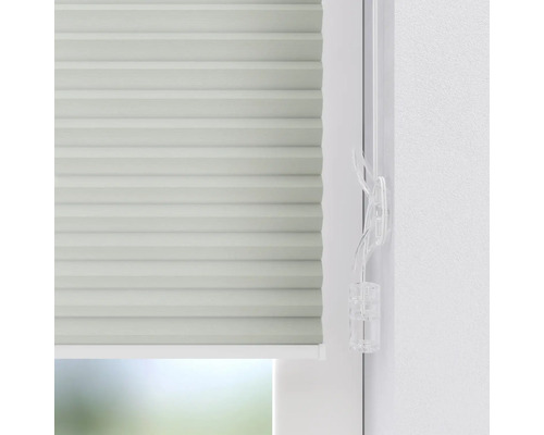 Detailaufnahme eines Faltstores mit Bedienelement zur Fensterdekoration