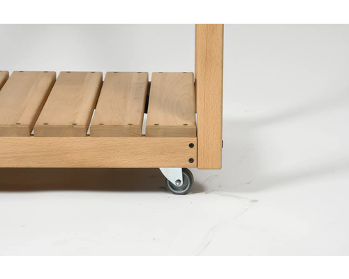 Vue détaillée d''un chariot de service en bois avec roulettes