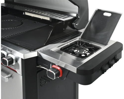 Detailansicht eines Gasgrills mit Seitenbrenner und Bedienknöpfen
