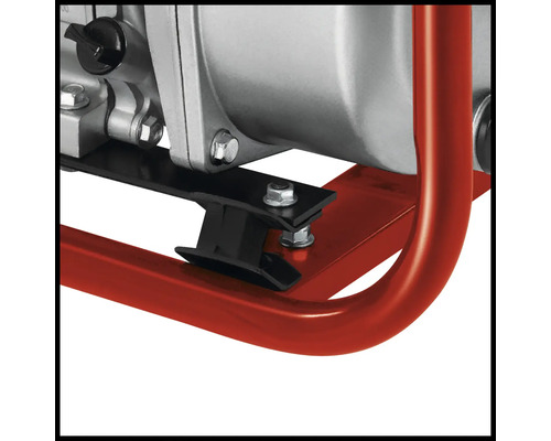 Vue détaillée d''une pompe à eau avec cadre tubulaire en acier rouge et pieds en caoutchouc noirs