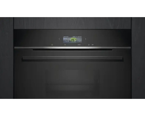 Gros plan d''un four noir avec affichage