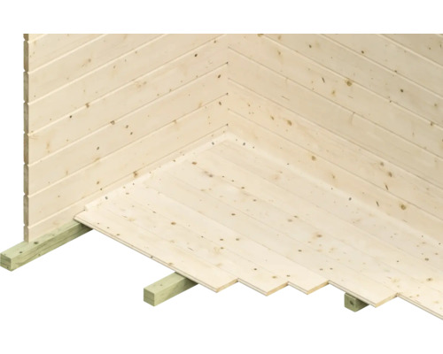 Vue d''angle d''une cabane de jardin avec des murs en bois et un plancher en bois sur des poutres de fondation