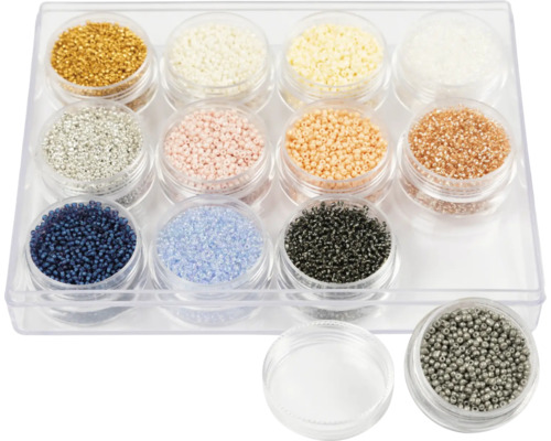 Assortiment de perles de verre dans une boîte de rangement