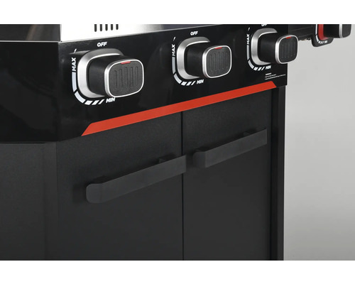 Vue détaillée d''un gril à gaz avec boutons de commande et portes d''armoire