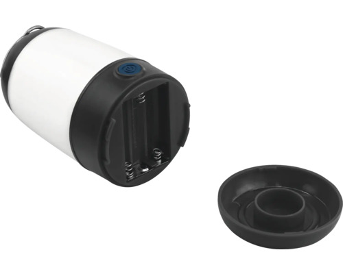 Lampe à piles avec compartiment à piles ouvert et couvercle retiré