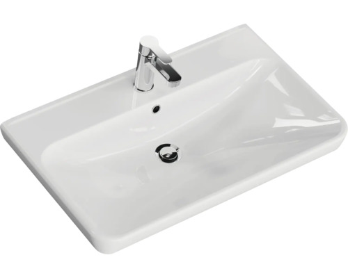 Lavabo blanc avec robinet chromé et garniture de vidange