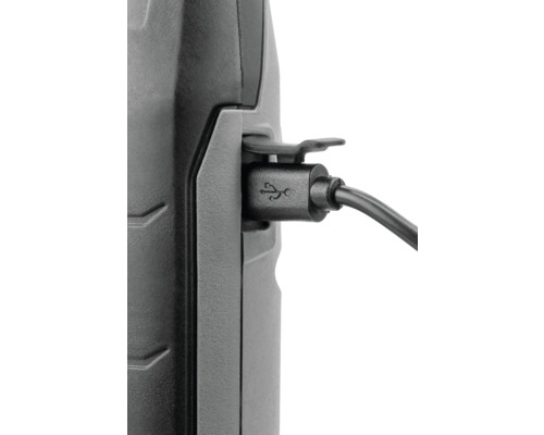 Vue détaillée d''un appareil avec port micro-USB et câble de charge