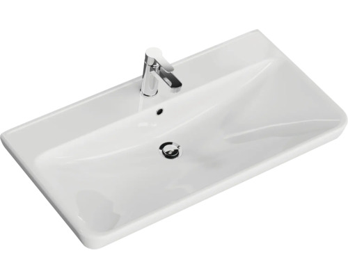 Vasque en céramique avec robinet pour la salle de bain