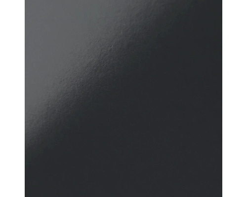 Gros plan d''une surface sombre et texturée.