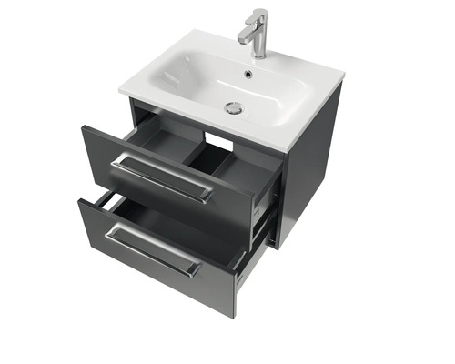 Meuble sous-lavabo avec deux tiroirs ouverts et lavabo