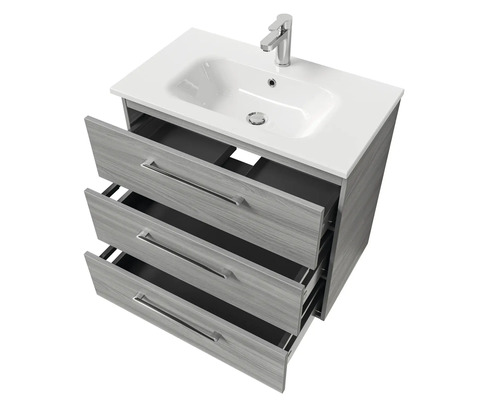 Meuble-lavabo avec trois tiroirs, lavabo et robinet