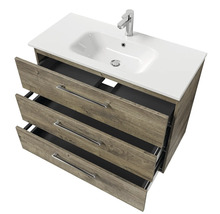Meuble sous-lavabo avec trois tiroirs, lavabo et robinet