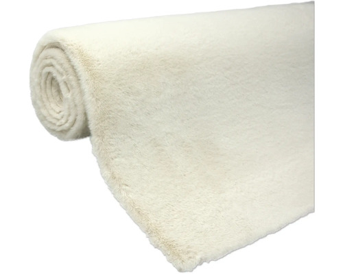 Tapis en fausse fourrure enroulé