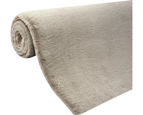 Tapis enroulé avec une surface hirsute