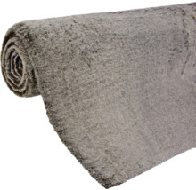 Tapis gris enroulé