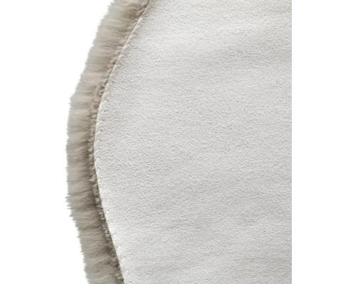 Gros plan d''une sous-couche de tapis ronde avec bordure