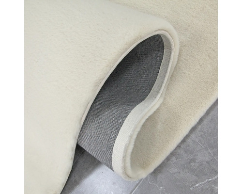 Vue détaillée d''un tapis avec velours et envers tissé