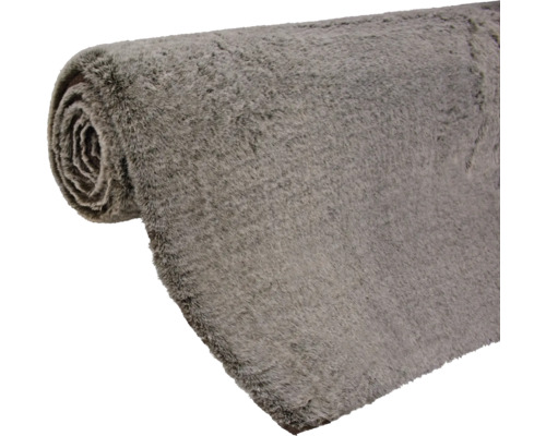 Grauer Teppich in Rollenform