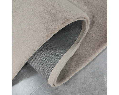 Vue détaillée d''un tapis beige à poils