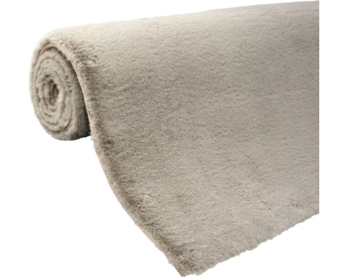 Tapis enroulé en matériau textile