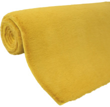 Tissu jaune enroulé