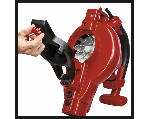 Aspirateur de feuilles rouge avec couvercle ouvert et rotor visible