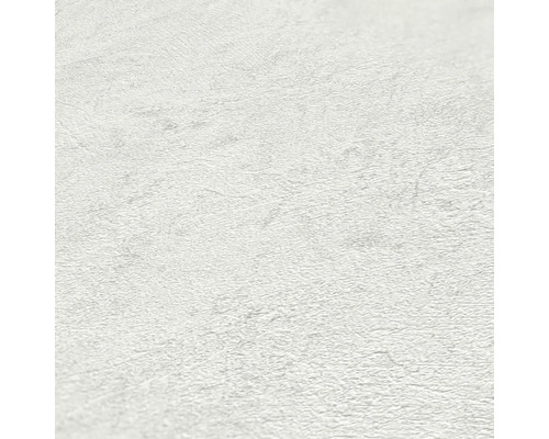 Gros plan d''un papier peint intissé blanc avec une légère structure