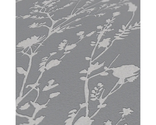 Gros plan d''un papier peint avec un motif de plantes