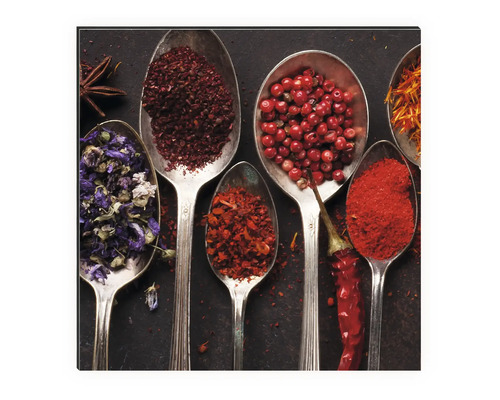 Tableau décoratif avec diverses épices dans des cuillères