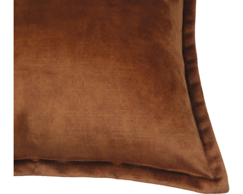 Gros plan d''un coussin carré en velours